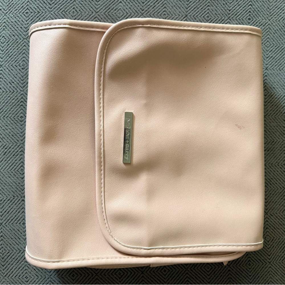 Calvin Klein Cream Cosmetic Bag with Minimalist Design